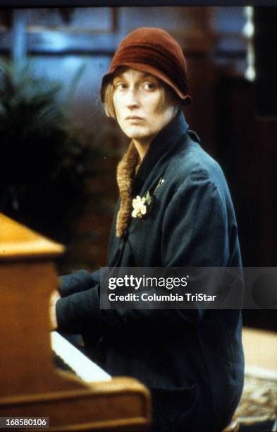 Meryl Streep plays piano in a scene from the film 'Ironweed', 1987.