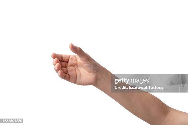 close up woman hand holding something like a bottle or can isolated on white background with clipping path. - glass holding stock pictures, royalty-free photos & images