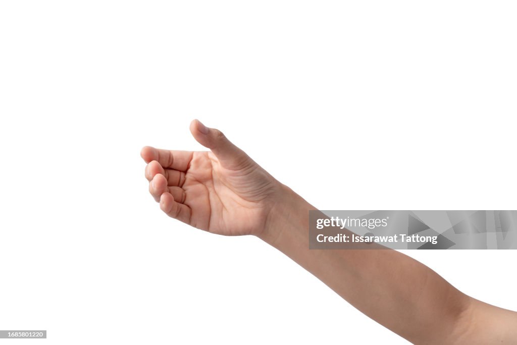 Close up woman hand holding something like a bottle or can isolated on white background with clipping path.