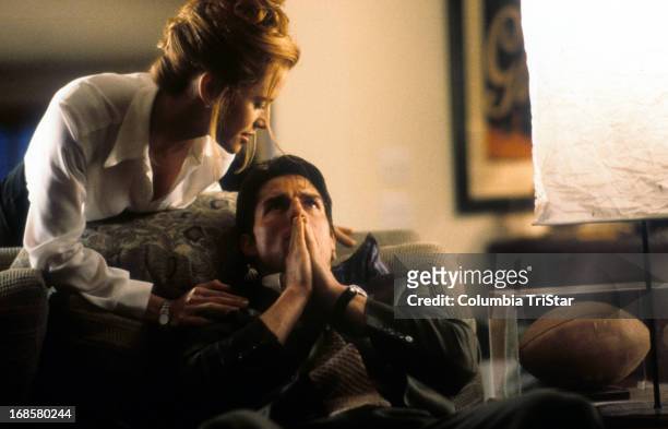 Kelly Preston comforts Tom Cruise in a scene from the film 'Jerry Maguire', 1996.