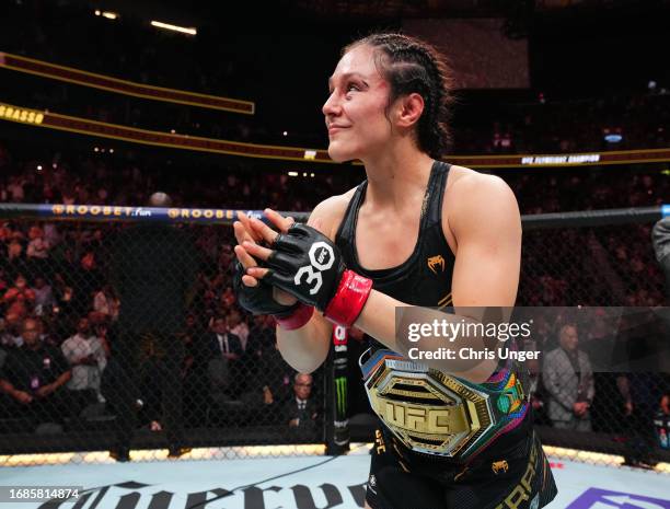 Alexa Grasso of Mexico reacts after retaining her title with a draw against Valentina Shevchenko of Kyrgyzstan in the UFC flyweight championship...