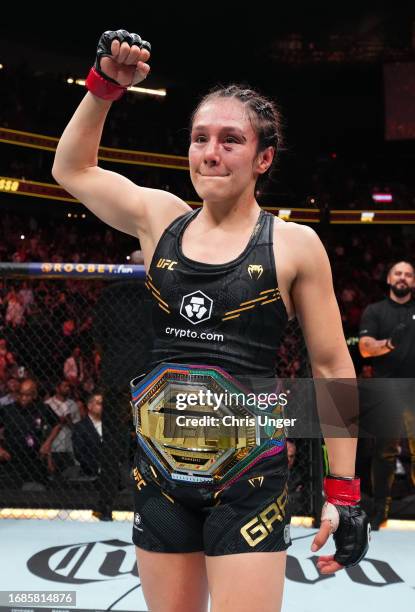 Alexa Grasso of Mexico reacts after retaining her title with a draw against Valentina Shevchenko of Kyrgyzstan in the UFC flyweight championship...