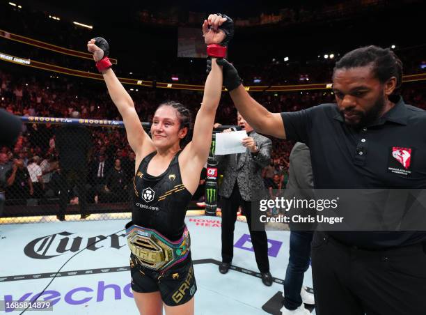 Alexa Grasso of Mexico reacts after retaining her title with a draw against Valentina Shevchenko of Kyrgyzstan in the UFC flyweight championship...