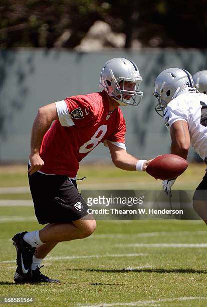 Tyler Wilson of the Oakland Raiders participates in drills during Rookie Mini-Camp on May 11, 2013 in Alameda, California.