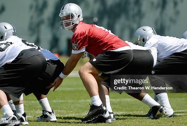 Tyler Wilson of the Oakland Raiders participates in drills during Rookie Mini-Camp on May 11, 2013 in Alameda, California.