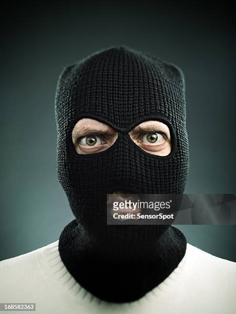 terroristischen porträt - bankräuber stock-fotos und bilder