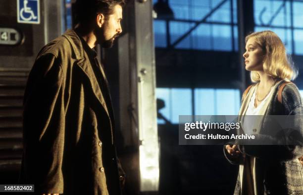 William Baldwin and Erika Eleniak in a scene from the film 'A Pyromaniac's Love Story', 1995.