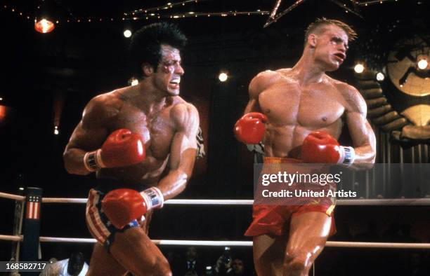 Sylvester Stallone punches Dolph Lundgren in a scene from the film 'Rocky IV', 1985.