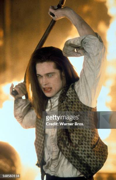 Brad Pitt yields a weapon in a scene from the film 'Interview With The Vampire: The Vampire Chronicles', 1994.