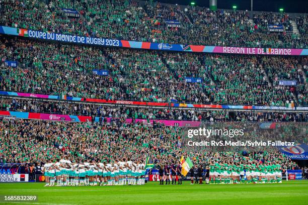 Both teams line up for national anthems prior the Rugby World Cup France 2023 match between South Africa and Ireland at Stade de France on September...