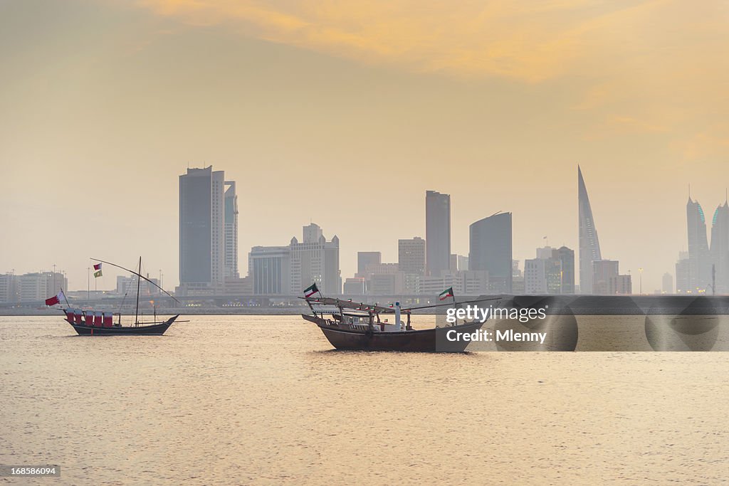Bahrain Manama Skyline and Dhows at Sunset