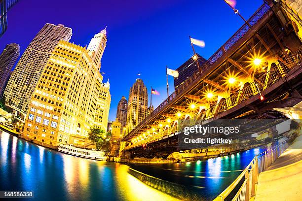 chicago river skyline and michigan avenue - bright chicago city lights stock pictures, royalty-free photos & images