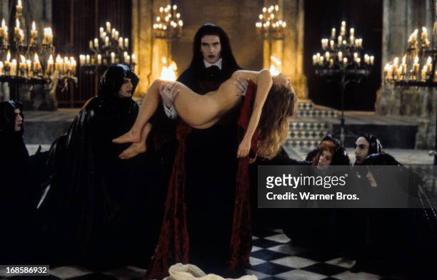Antonio Banderas carries a naked woman in a scene from the film 'Interview With The Vampire: The Vampire Chronicles', 1994.