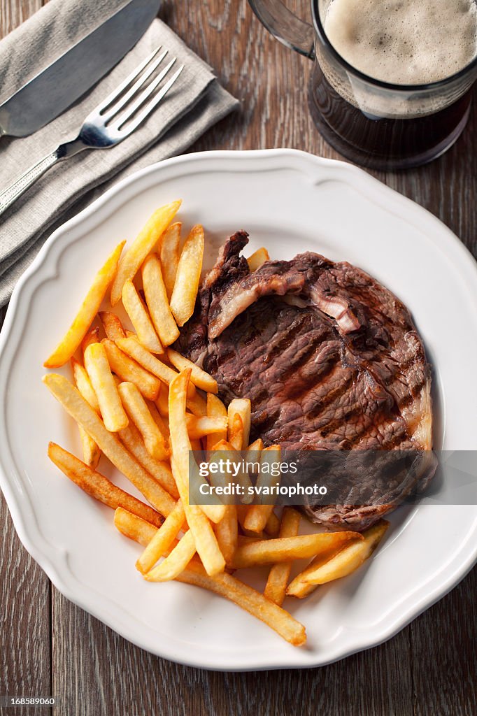 Beef steak with French fries