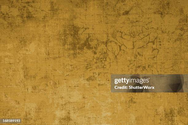 gold colored grunge pattern - mottled paper stock pictures, royalty-free photos & images