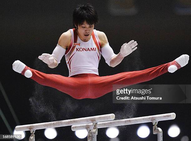 Kohei Uchimura of Japan competes on the parallel bars during day two of the 67th All Japan Artistic Gymnastics Individual All Around Championship at...