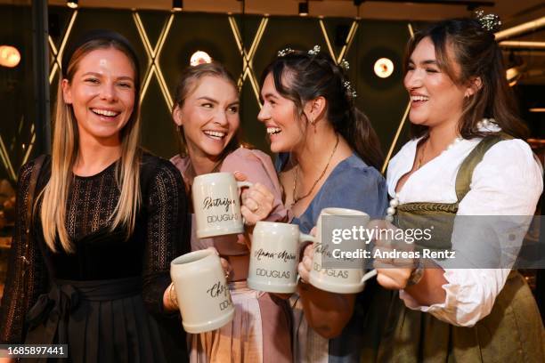 Cheyenne Pahde, Patrizia Palme, Anna-Maria Damm and Katharina Damm attend the Douglas Wiesn Beauty Gaudi on September 16, 2023 in Munich, Germany.