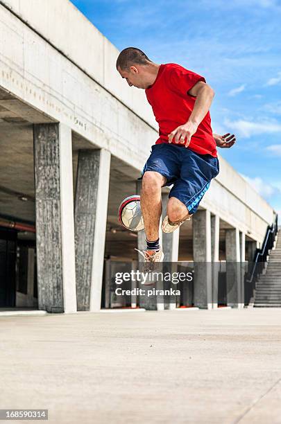 urban soccer player - juggling stock pictures, royalty-free photos & images