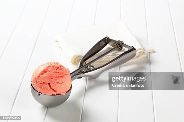 scoop of pink ice cream - sorbet isolated stock pictures, royalty-free photos & images