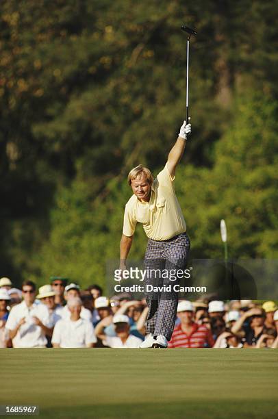Jack Nicklaus of the United States celebrates his birdie putt on the 17th hole during the US Masters Golf Tournament on 13th April 1986 at the...