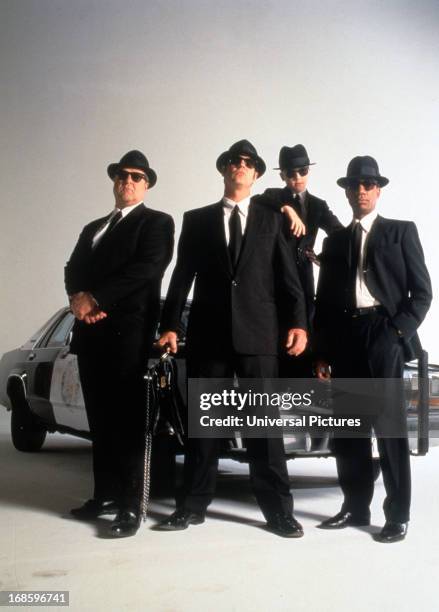 Dan Aykroyd, John Goodman and J Evan Bonifant wearing a suit, hat and suglasses in a scene from the film 'Blue Brothers 2000', 1998.