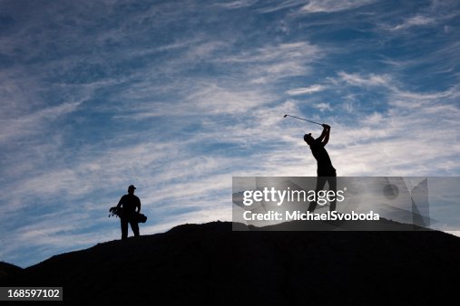 Golfer and Caddy Silhouette Golfer and Caddy Silhouette