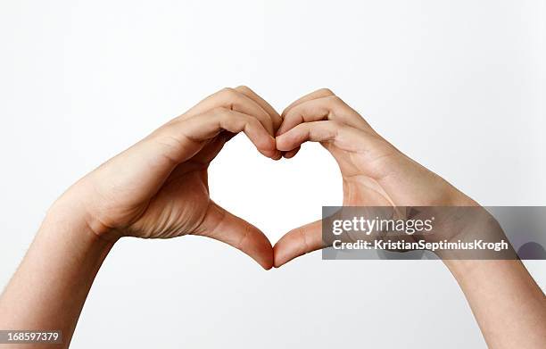 hands making heartshape - hand with hart stockfoto's en -beelden