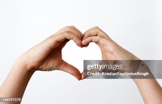 Mãos fazendo heartshape Mãos fazendo heartshape