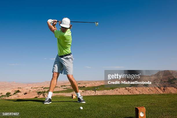 tee shot - golfer swing stock pictures, royalty-free photos & images
