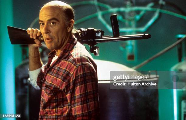 Reggie Bannister arms himself in a scene from the film 'Phantasm III: Lord Of The Dead', 1994.