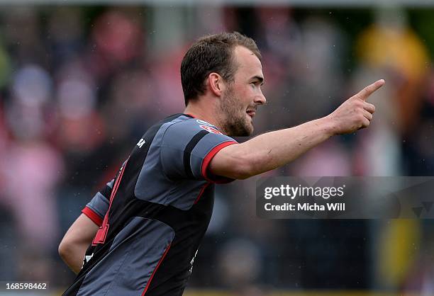 Erwin Hoffer of Kaiserslautern celebrates after scoring the opening/first goal during the second Bundesliga match at Jahnstadion on May 12, 2013 in...