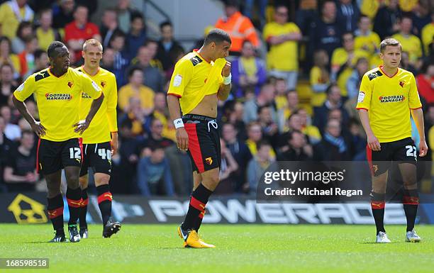 Lloyd Doyley, Joel Ekstrand, Troy Deeney and Almen Abdi of Watford look dejected as David Nugent of Leicester City scores their first goal during the...