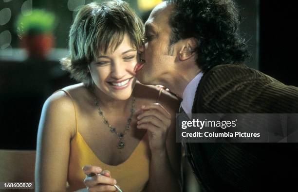 Colleen Haskell is licked by Rob Schneider in scene from the film 'The Animal', 2001.