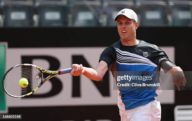 Sam Querrey of the USA plays a forehand against Richard Gasquet of France in their first round match during day one of the Internazionali BNL...