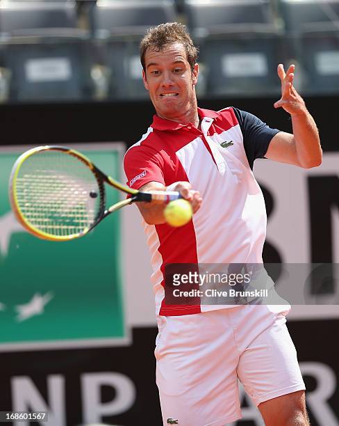 Richard Gasquet of France plays a forehand against Sam Querrey of the USA in their first round match during day one of the Internazionali BNL...