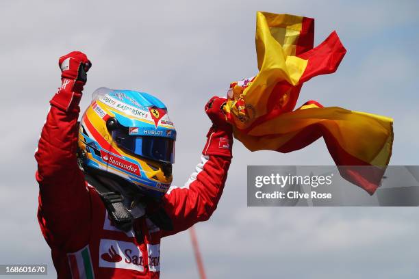 Fernando Alonso of Spain and Ferrari celebrates in parc ferme after winning the Spanish Formula One Grand Prix at the Circuit de Catalunya on May 12,...