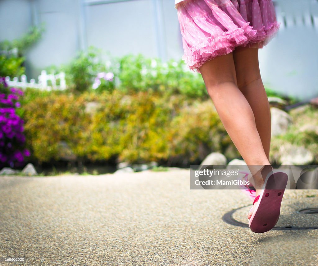 Attractive-looking feet in sandals