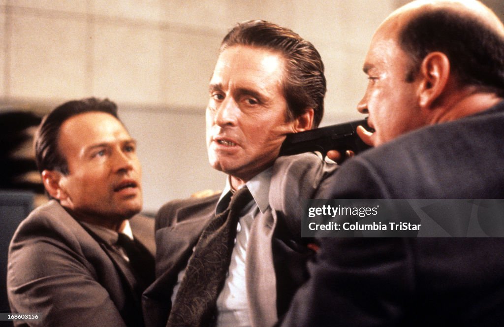 Basic Mike Michael Douglas has gun pointed at him in scene from the film 'Basic ...