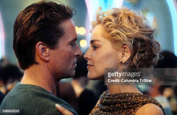 Michael Douglas and Sharon Stone dancing in scene from the film 'Basic Instinct', 1992.