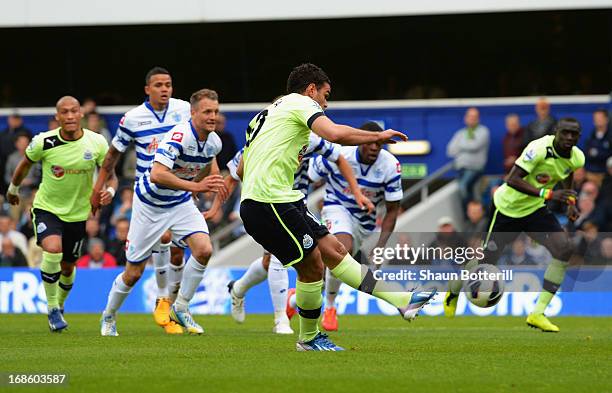Hatem Ben Arfa of Newcastle United scores their first goal from the penalty spot during the Barclays Premier League match between Queens Park Rangers...