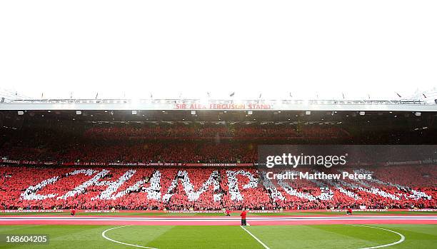 Manchester United fans form a mosaic reading Champions ahead of the Barclays Premier League match between Manchester United and Swansea City at Old...