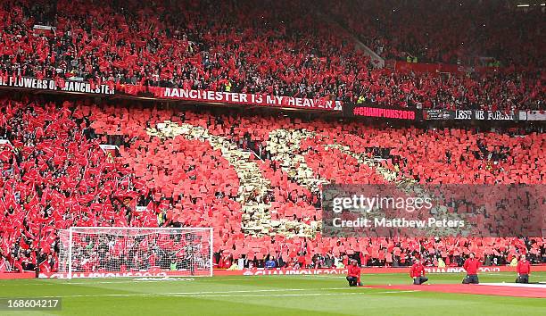 Manchester United fans form a mosaic reading 20, signifying 20 League titles, ahead of the Barclays Premier League match between Manchester United...