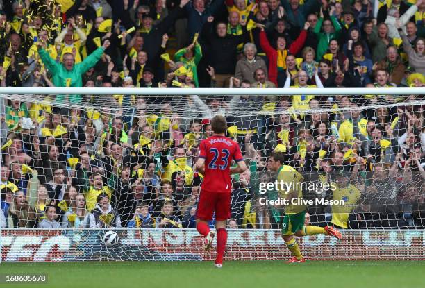 Grant Holt of Norwich City scores during the Barclays Premier League match between Norwich City and West Bromwich Albion at Carrow Road on May 12,...