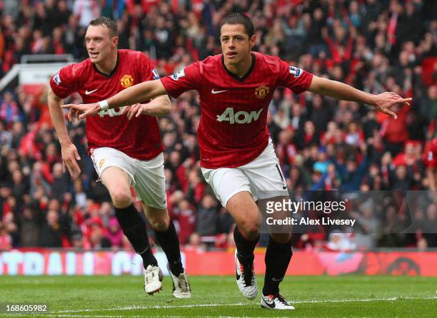 Javier Hernandez of Manchester United celebrates after scoring the opening goal during the Barclays Premier League match between Manchester United...