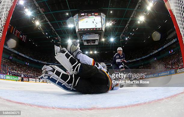 Aaron Palushaj of USA fails to score over Dennis Endras , goaltender of Germany during the IIHF World Championship group H match between USA and...
