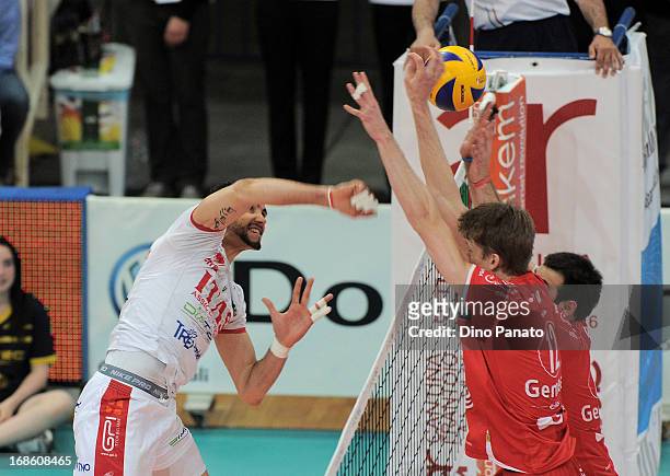 Matey Kaziyski of Itas Diatec Trentino spikes the ball against to Maxwell Philip Holt of Copra Elior Piacenza during game 5 of Playoffs Finals...