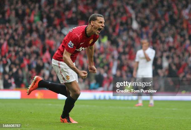 Rio Ferdinand of Manchester United celebrates scoring their second goal during the Barclays Premier League match between Manchester United and...