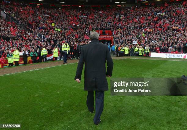 Manager Sir Alex Ferguson of Manchester United leaves the pitch after the Barclays Premier League match between Manchester United and Swansea at Old...