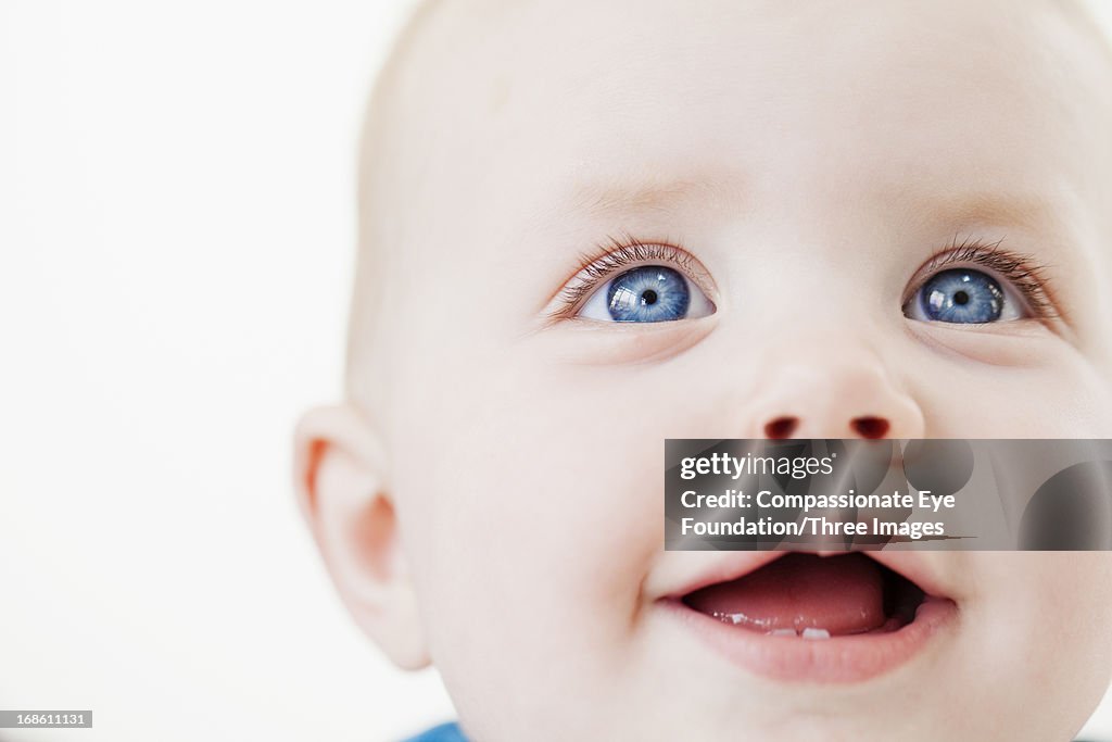 Close up portrait of smiling baby