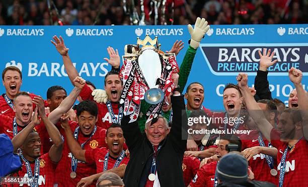 Manchester United Manager Sir Alex Ferguson lifts the Premier League trophy following the Barclays Premier League match between Manchester United and...